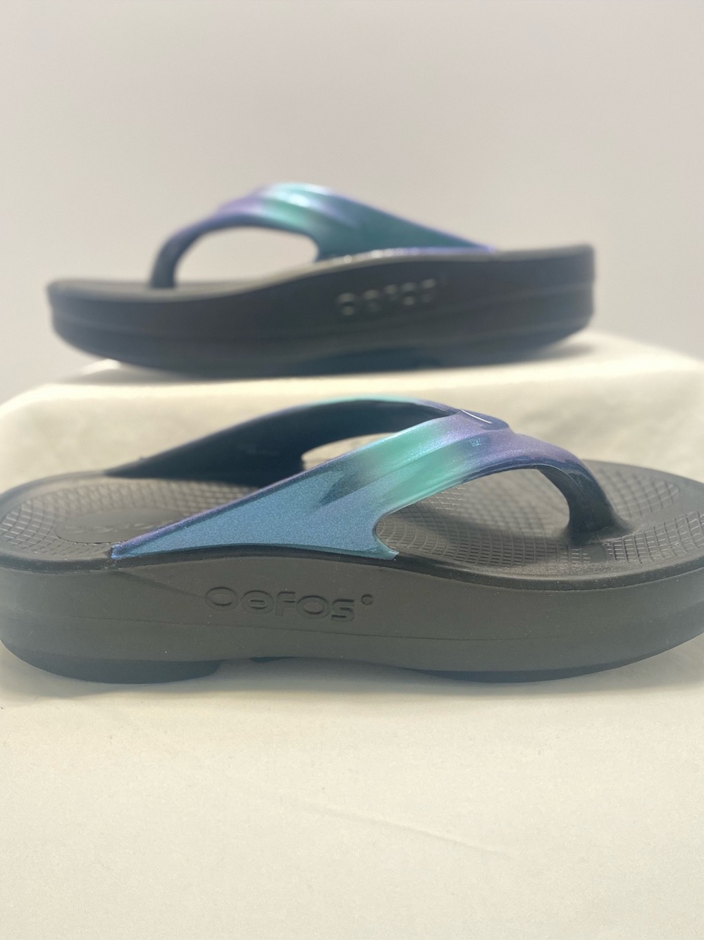 OOFOS Women’s Black Sandals with Iridescent Teal-Purple Straps
